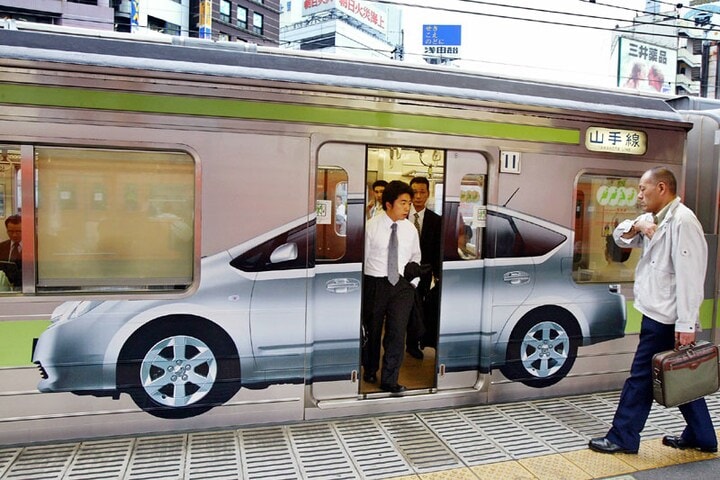 Toyota Prius reclame metro Tokio | Foto: ANP/AFP