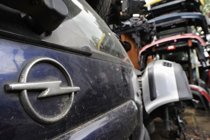 Opel op de sloop | Foto: ANP/AFP