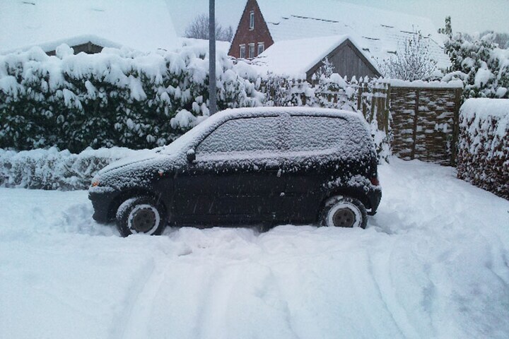 De familie Van Putten in de sneeuw