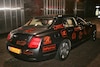 Gumball 3000 op Waterlooplein (foto: Roland Tameli