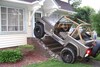 Jeep Wrangler tegen huis