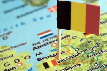 België