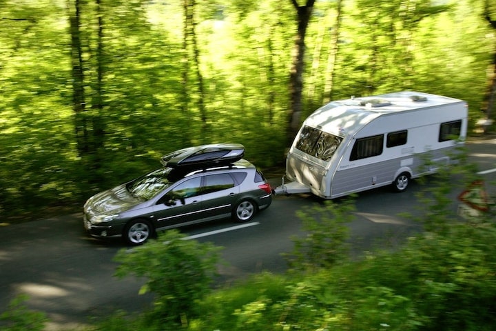 Vakantie Peugeot 407 Break met caravan