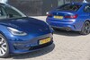 BMW 330i Tesla Model 3
