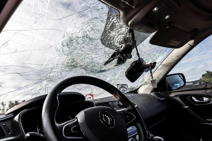 Auto schade ruit kapot (ANP)