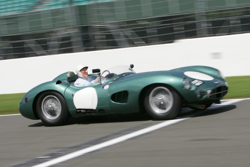 Sir Stirling Moss in Aston Martin