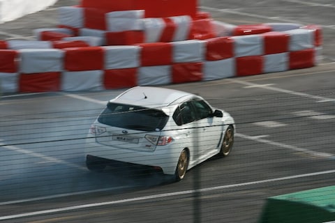 Gummende Subaru Impreza WRX STi en Lamborghini Gallardo