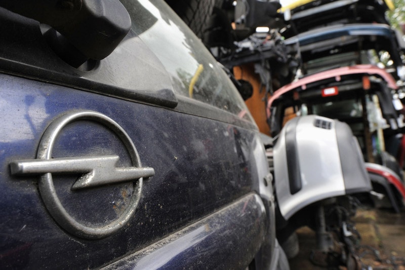 Opel op de sloop | Foto: ANP/AFP