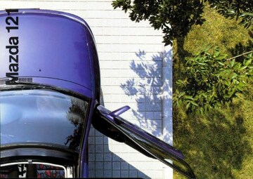 Brochures Mazda 121 - Folders