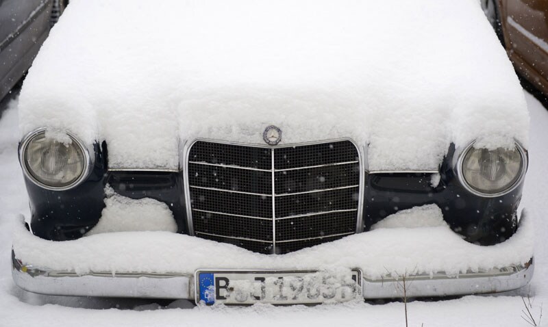 Mercedes in de sneeuw | Foto: ANP/AFP