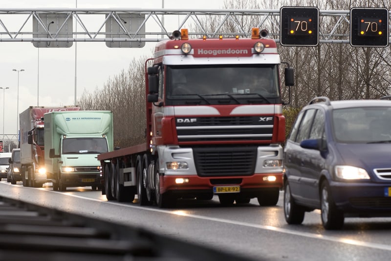 Vrachtwagens in de file | Foto: ANP