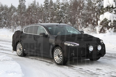 Kia's topmodel gespot in de sneeuw én geschetst