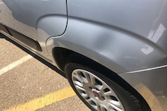 Schade huurauto auto huren deuk achterspatbord