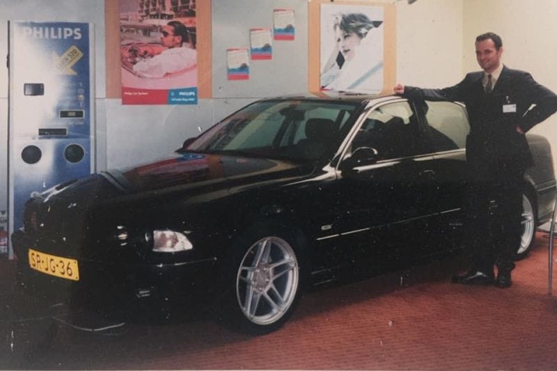 Stéphan Vermeulen in de jaren negentig bij een BMW 523i