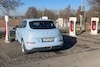 Ora Funky Cat aan Tesla Supercharger