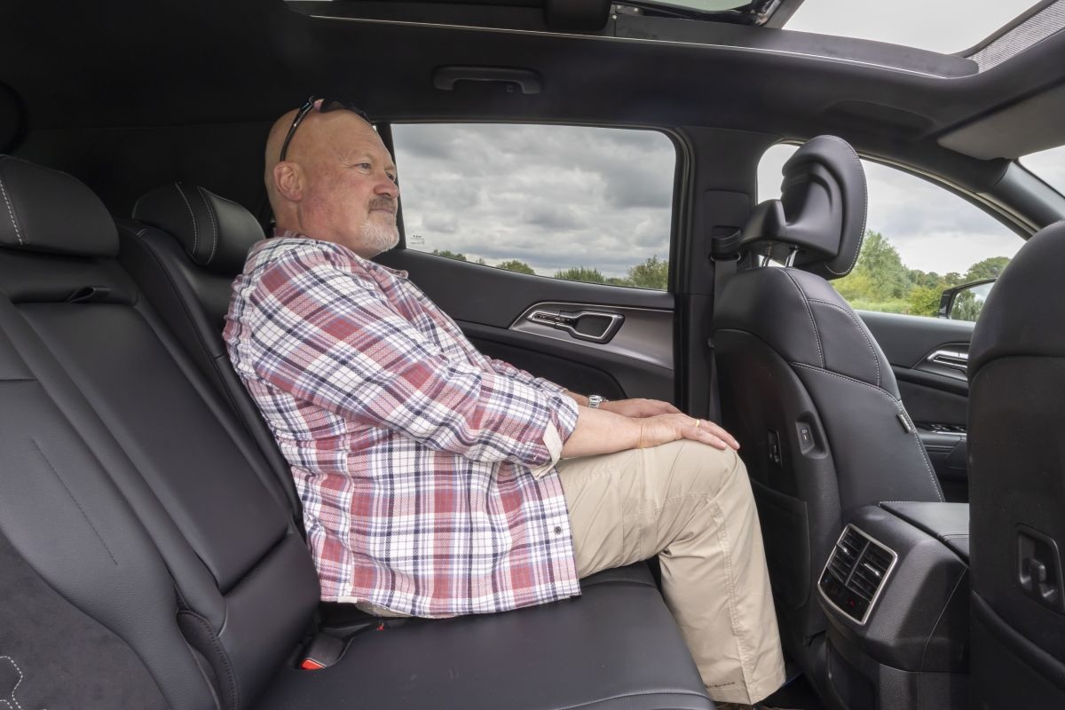 zitten achterin triotest occie kia sportage